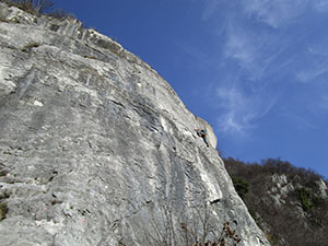 La Falesia di Galbiate; si intravede un arrampicatore in azione